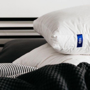 This gusseted down-alternative pillow provides a 2-inch gentle lift to align the neck and reduce morning stiffness. Its unique sidewall construction enhances airflow to keep you cool, while the plush microfiber fill offers a "gel-like" softness that stays supportive for side, back, and combination sleepers.